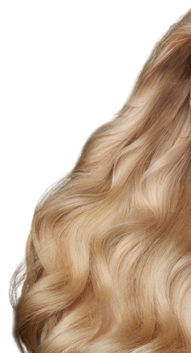 Lange, gewellte Echthaar-Extensions in Blond